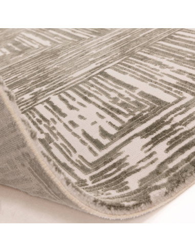 Discover the Kuza Portrait Khaki, a modern luxury rug with a lustrous geometric stripe design, blending style, comfort, and eas