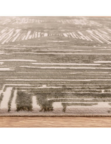 Discover the Kuza Portrait Khaki, a modern luxury rug with a lustrous geometric stripe design, blending style, comfort, and eas