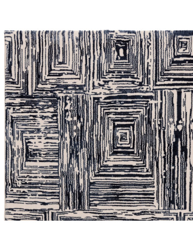 Elevate your space with the Kuza Portrait Navy modern luxury rug, featuring a lustrous geometric design and soft, durable synth