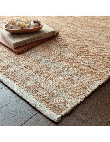 Handwoven natural fibre rug with geometric Berber pattern, crafted from jute blend for durability and eco-friendly style in any