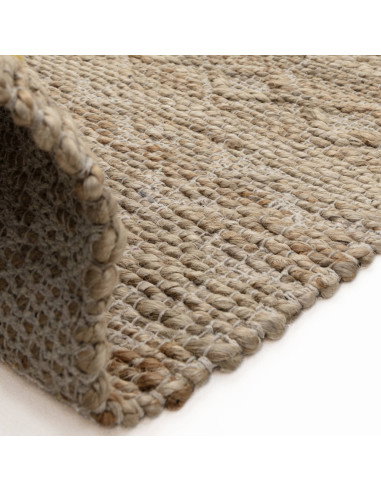 Handwoven natural fibre rug with geometric Berber pattern, crafted from jute blend for durability and eco-friendly style in any