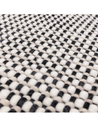 Elevate your home with the Avalon Monochrome natural fibre rug, featuring handwoven wool for lasting comfort and timeless monoc