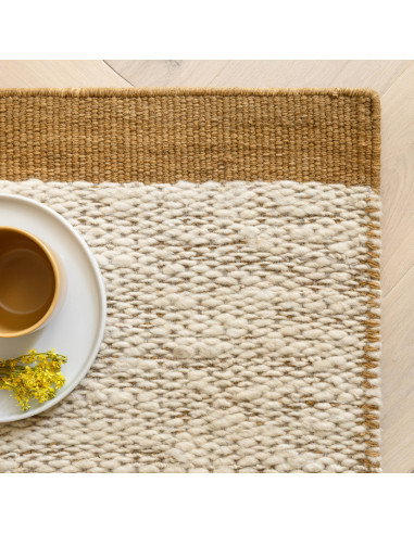 Elevate your home with the Lima Gold natural fibre rug—handwoven wool in warm tones, blending durability and timeless style for