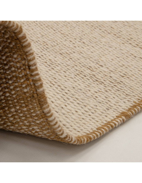 Elevate your home with the Lima Gold natural fibre rug—handwoven wool in warm tones, blending durability and timeless style for