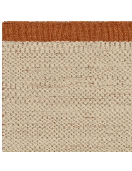 Elevate your space with the Lima Rust natural fibre rug—handwoven wool design featuring warm rust borders for timeless style an