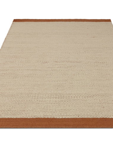 Elevate your space with the Lima Rust natural fibre rug—handwoven wool design featuring warm rust borders for timeless style an