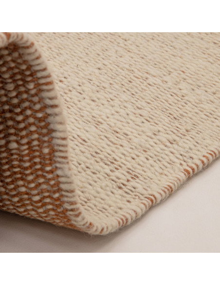 Elevate your space with the Lima Rust natural fibre rug—handwoven wool design featuring warm rust borders for timeless style an