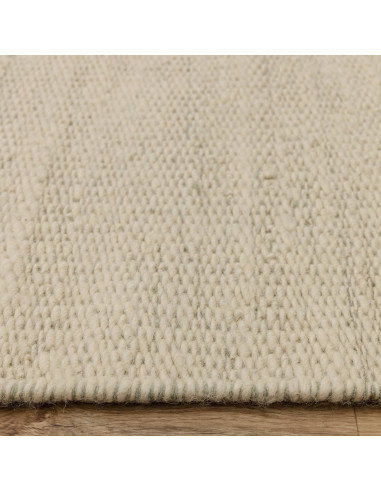 Tappeto Lima Sage in lana naturale, design artigianale e sostenibile, perfetto per un soggiorno elegante e confortevole con sti