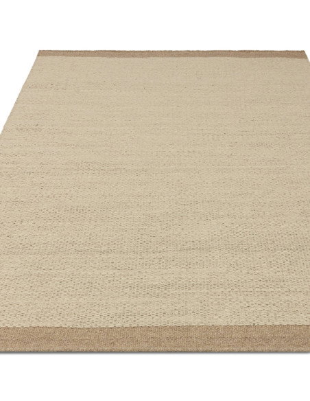 Tappeto Lima Sand in lana naturale, design tinta unita perfetto per un soggiorno elegante e accogliente. Qualità artigianale e