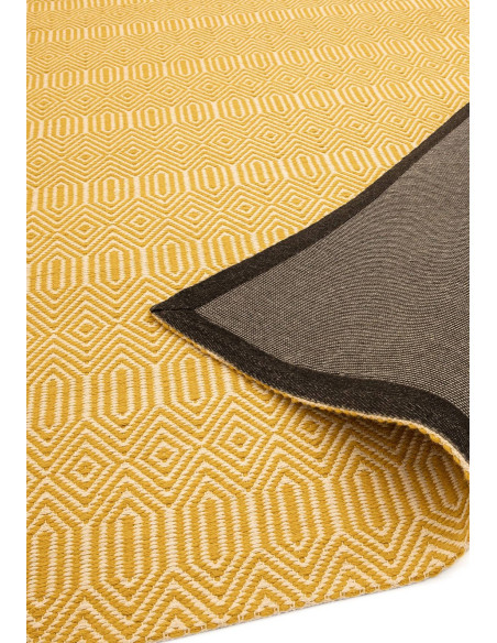 Add warmth and style with the Sloan Mustard natural fibre rug, featuring handwoven geometric patterns in durable wool and cotto