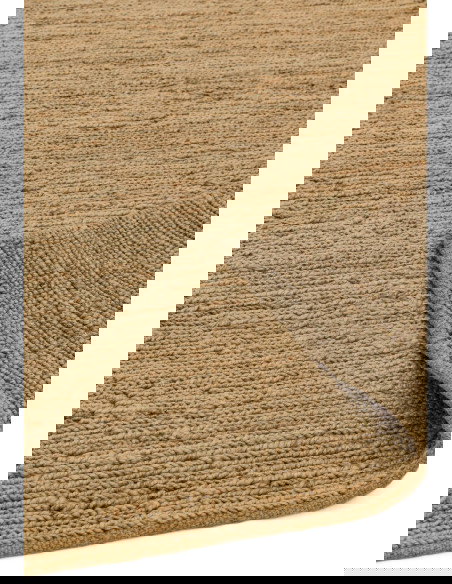 Tappeto Soumak Natural in juta, design tinta unita, resistente e sostenibile, ideale per soggiorni moderni e ambienti naturali.