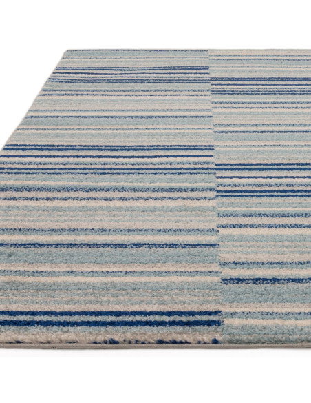 Elevate your space with the Muse Blue Stripe MU05, a modern designer rug featuring vibrant blue stripes for a stylish, contempo