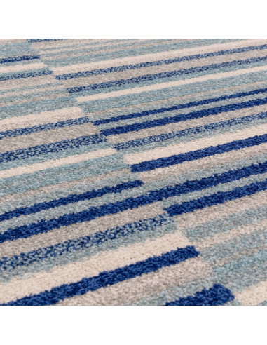 Tappeto Muse Blue Stripe MU05: design moderno e colori vivaci per un soggiorno elegante e contemporaneo. Perfetto tra i tappeti