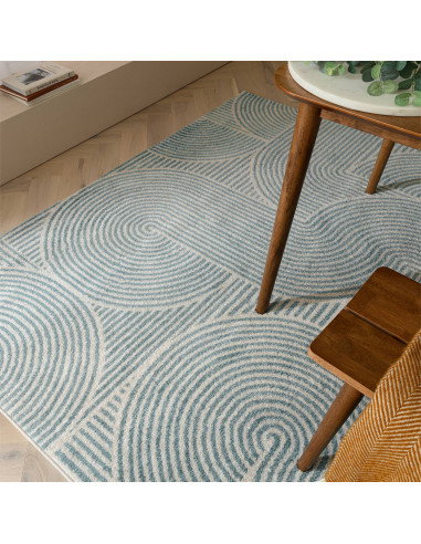Elevate your space with the Muse Blue Swirl MU02, a modern designer rug featuring vibrant geometric patterns and durable, easy-