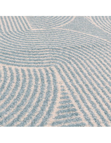 Elevate your space with the Muse Blue Swirl MU02, a modern designer rug featuring vibrant geometric patterns and durable, easy-