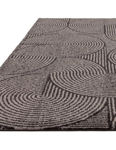 Elevate your space with the Muse Charcoal Swirl MU01, a durable modern designer rug featuring a stylish geometric pattern and p