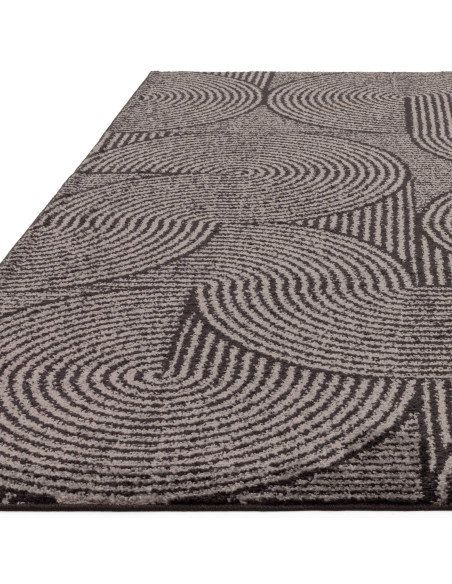 Elevate your space with the Muse Charcoal Swirl MU01, a durable modern designer rug featuring a stylish geometric pattern and p