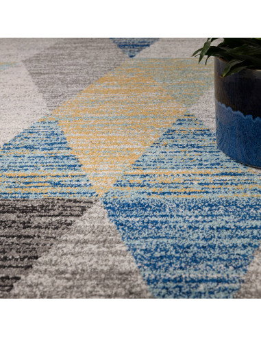 Tappeto Muse Harlequin Blue MU25: design geometrico moderno e colori raffinati, perfetto tra i tappeti moderni soggiorno per un