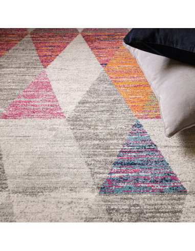 Add vibrant style with the Muse Harlequin Pink MU24, a durable modern colourful area rug featuring geometric flair and easy-car