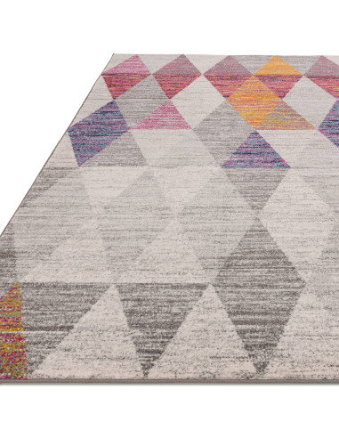 Add vibrant style with the Muse Harlequin Pink MU24, a durable modern colourful area rug featuring geometric flair and easy-car