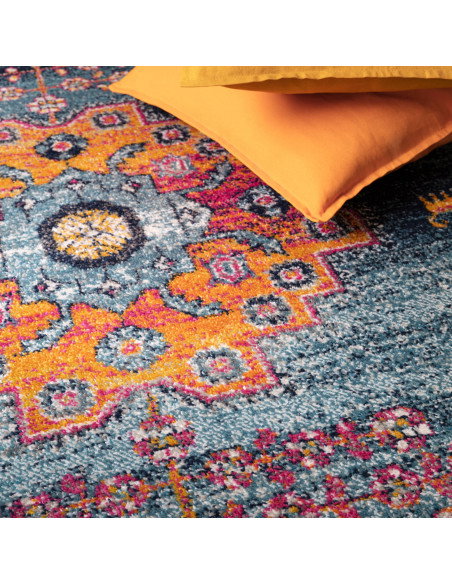 Brighten your space with the Muse Medalion Bright MU29, a durable modern colourful area rug featuring bold geometric patterns a