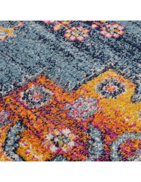 Brighten your space with the Muse Medalion Bright MU29, a durable modern colourful area rug featuring bold geometric patterns a