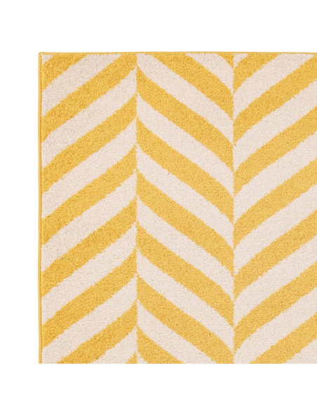 Brighten your space with the Muse Yellow Chevron MU08, a durable modern designer rug featuring vibrant chevron patterns for sty