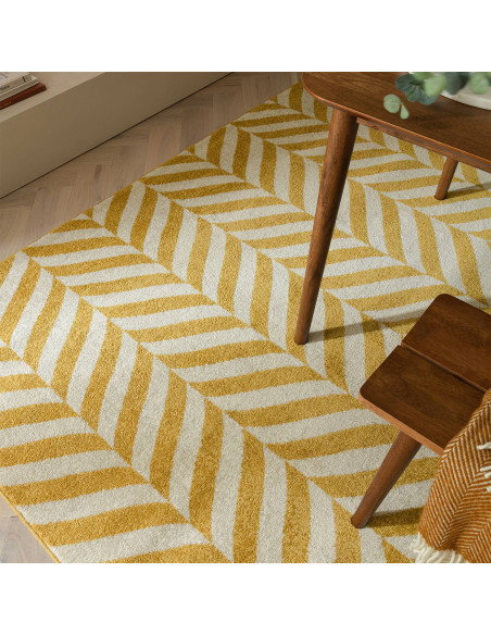 Brighten your space with the Muse Yellow Chevron MU08, a durable modern designer rug featuring vibrant chevron patterns for sty