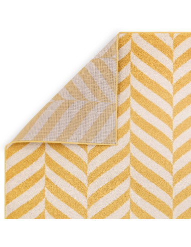 Brighten your space with the Muse Yellow Chevron MU08, a durable modern designer rug featuring vibrant chevron patterns for sty