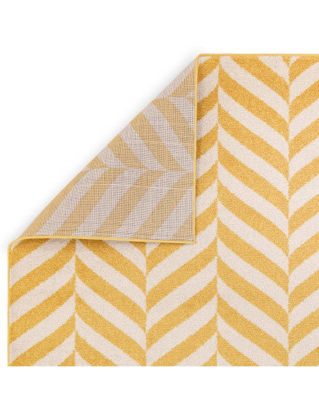 Brighten your space with the Muse Yellow Chevron MU08, a durable modern designer rug featuring vibrant chevron patterns for sty
