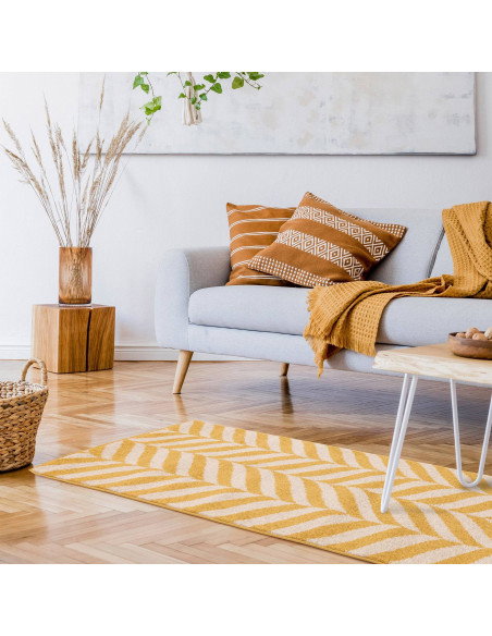 Brighten your space with the Muse Yellow Chevron MU08, a durable modern designer rug featuring vibrant chevron patterns for sty