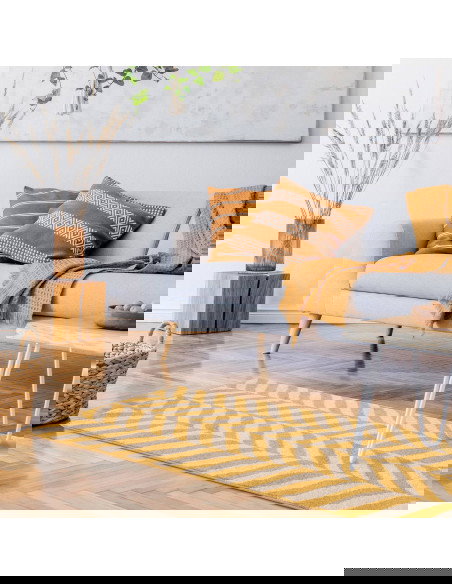 Tappeto Muse Yellow Chevron MU08: design geometrico e colori caldi per un soggiorno moderno e accogliente. Perfetto tra i tappe