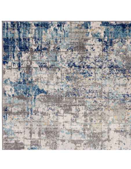 Elevate your space with the Nova Illusion NV40 modern area rug, featuring a durable, easy-to-clean abstract design perfect for