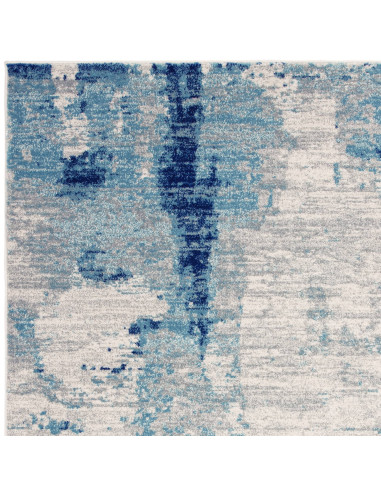 Tappeto moderno soggiorno Nova Mirage NV36: design astratto blu, comfort e resistenza per un ambiente elegante e contemporaneo.