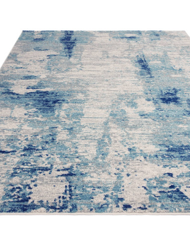 Tappeto moderno soggiorno Nova Mirage NV36: design astratto blu, comfort e resistenza per un ambiente elegante e contemporaneo.