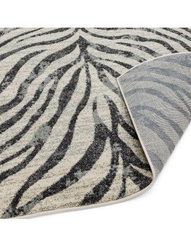 Elevate your space with the Nova NV27 Zebra Grey, a stylish modern area rug featuring a bold zebra pattern and easy-care polypr