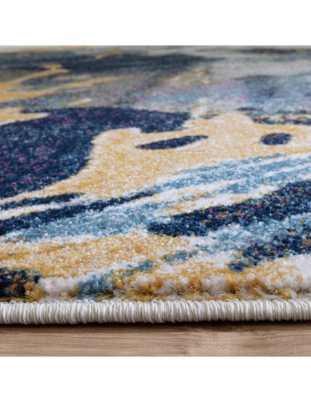 Discover the Nova Sonic NV41 modern area rug with a vibrant abstract design, durable polypropylene, and plush comfort for easy