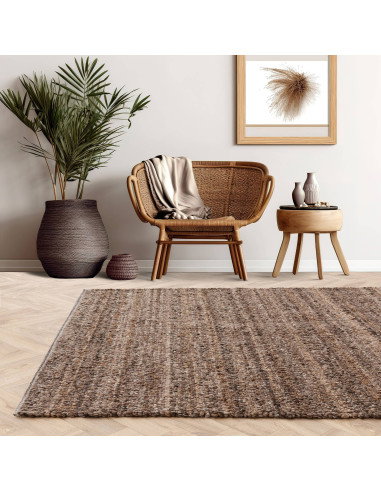 Elevate your space with the Abbus Tawny Brown boho rug—handwoven texture, durable polyester, and warm earthy tones for cozy, st