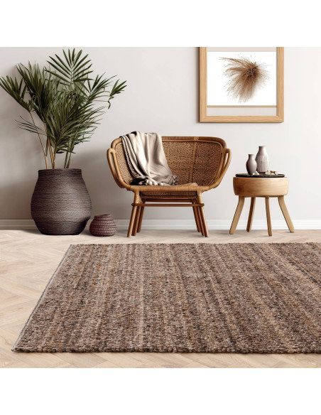 Elevate your space with the Abbus Tawny Brown boho rug—handwoven texture, durable polyester, and warm earthy tones for cozy, st